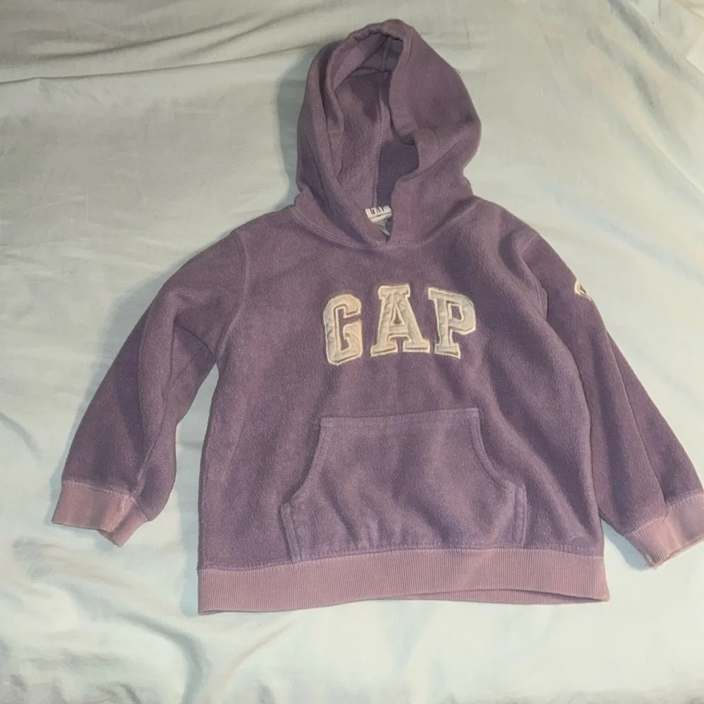 Gap size 3 years girls, purple with white gap little tears on cuff of the sleave